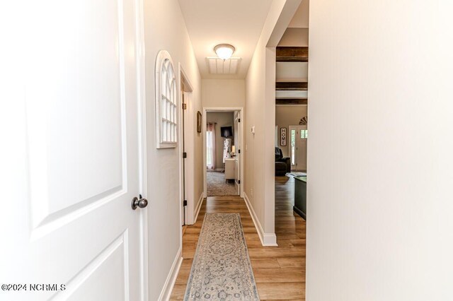 hallway featuring light hardwood / wood-style flooring