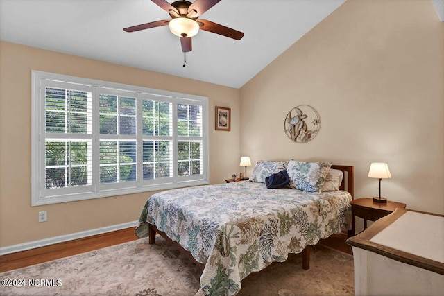 bedroom featuring lofted ceiling, ceiling fan, and hardwood / wood-style flooring