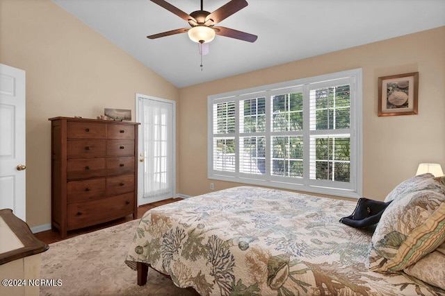 bedroom featuring vaulted ceiling, hardwood / wood-style flooring, and ceiling fan