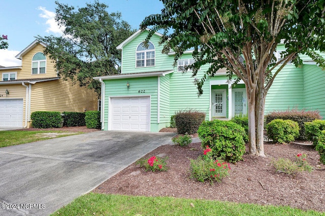 front facade with a garage