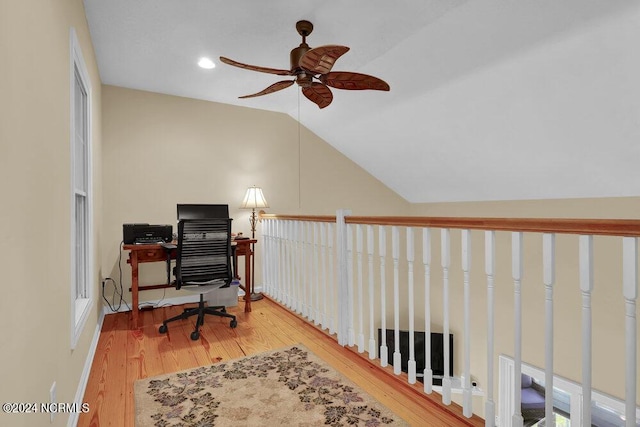 home office with lofted ceiling, ceiling fan, recessed lighting, and wood finished floors