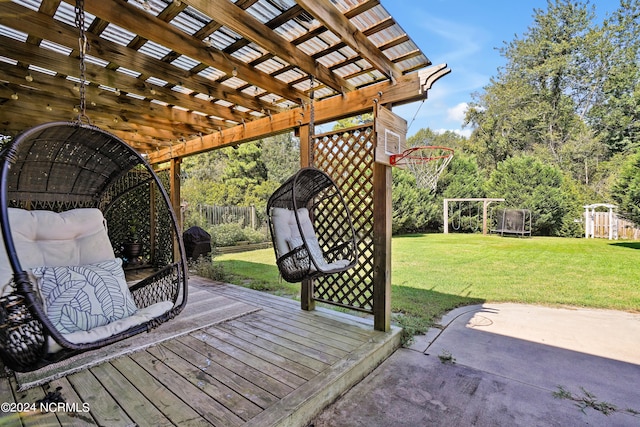 wooden deck with a pergola, a storage shed, a lawn, and a patio