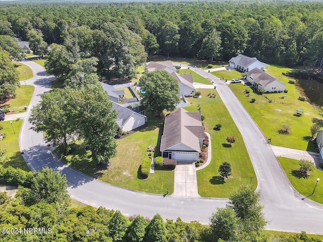 bird's eye view with a forest view