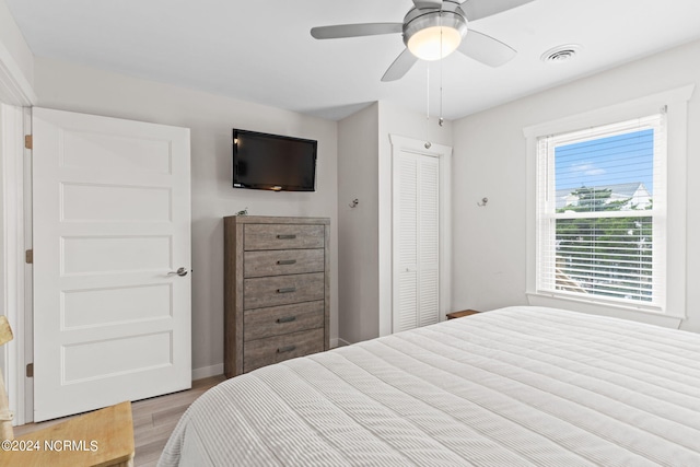 bedroom featuring ceiling fan and light wood-type flooring