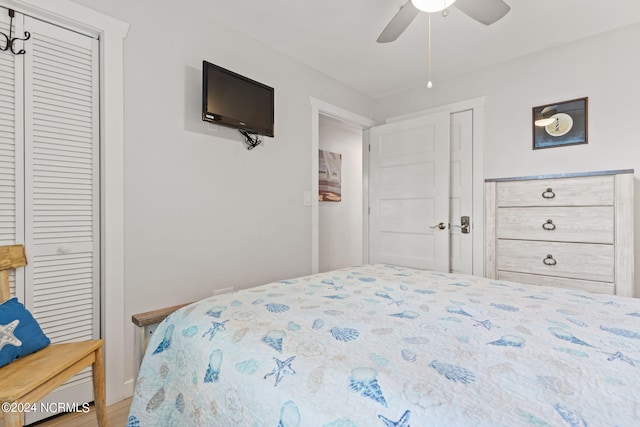 bedroom with a closet and ceiling fan