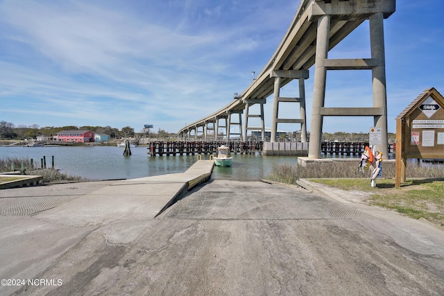 dock area with a water view