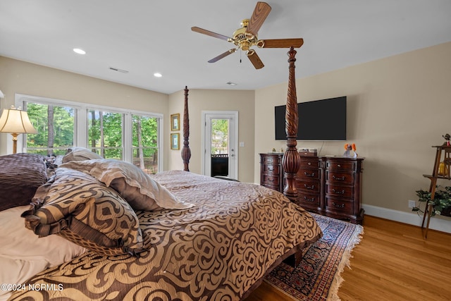 bedroom with ceiling fan, access to exterior, and light hardwood / wood-style flooring