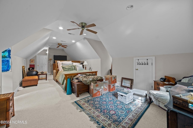 bedroom with lofted ceiling, ceiling fan, and light carpet