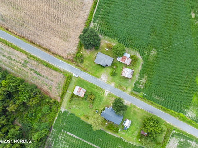 birds eye view of property featuring a rural view