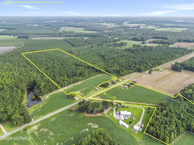 birds eye view of property with a rural view and a water view
