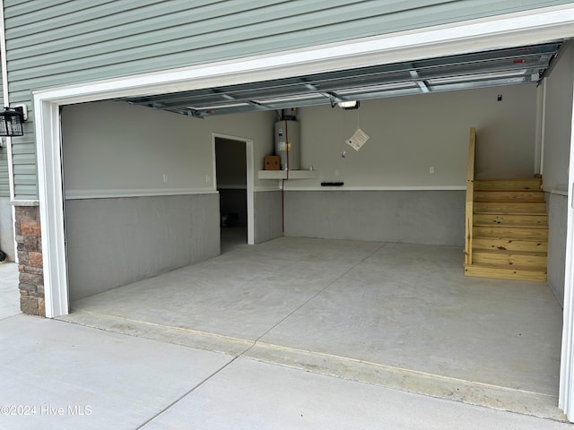 garage featuring electric water heater