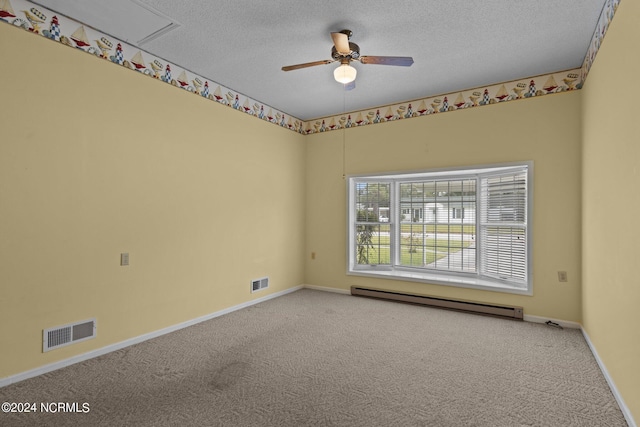 carpeted spare room with ceiling fan, a baseboard radiator, and a textured ceiling