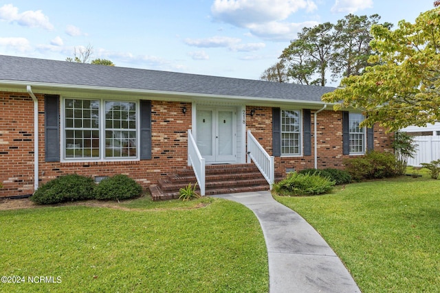 ranch-style house with a front yard