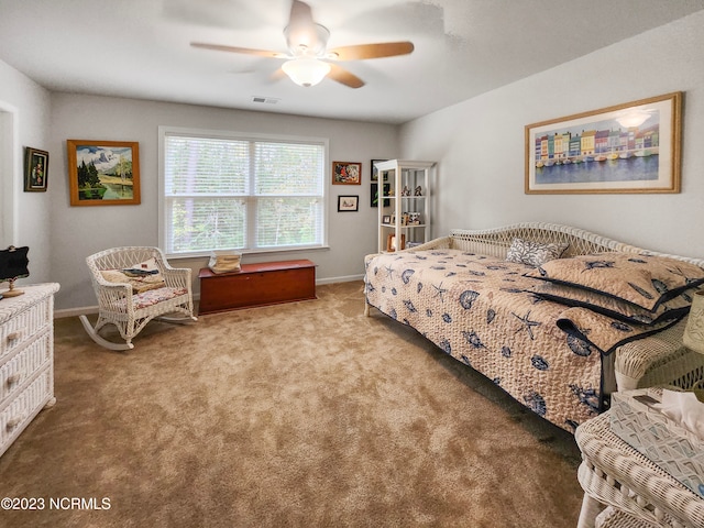 bedroom with ceiling fan and carpet floors