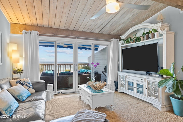 carpeted living room with wood ceiling, vaulted ceiling, and ceiling fan