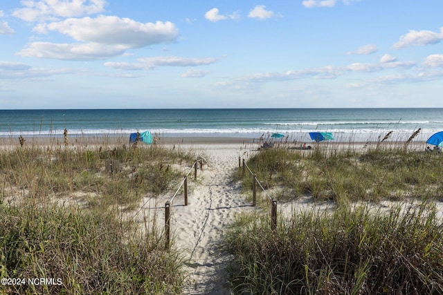 property view of water featuring a view of the beach