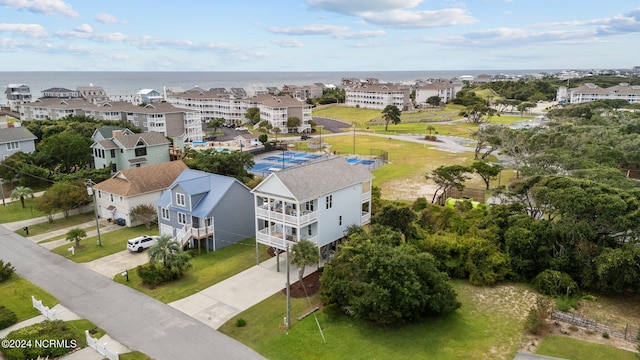 drone / aerial view with a water view