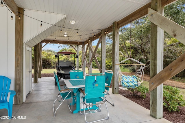 view of patio / terrace with outdoor dining space and a gazebo