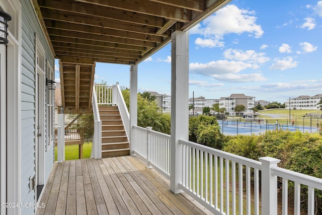 wooden terrace featuring stairway