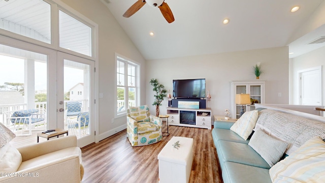 living area with recessed lighting, visible vents, ceiling fan, and wood finished floors