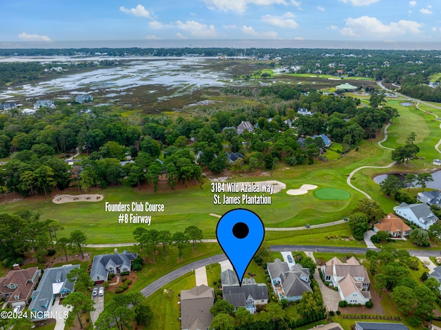 3184 Wild Azalea Way SE, Southport, NC 28461 - aerial view of residential area featuring a local golf course and a large body of water