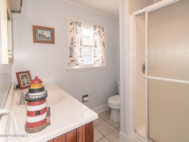 bathroom featuring tile patterned floors, toilet, a shower with shower door, and ornamental molding