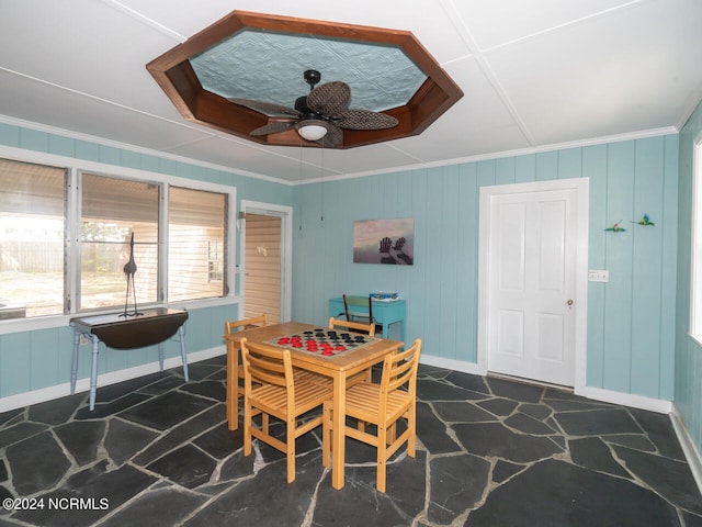 dining room featuring ceiling fan and crown molding