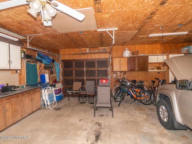 garage with wood walls