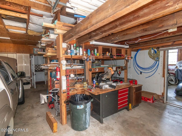 garage with a workshop area