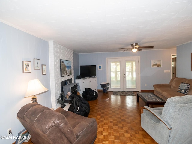 living room with ceiling fan, parquet floors, crown molding, and french doors