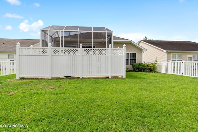 view of yard with a lanai