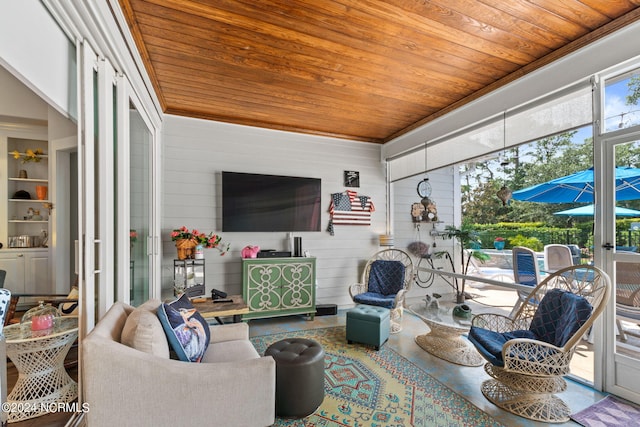 living room featuring wooden walls and wooden ceiling