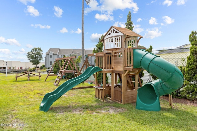 view of jungle gym featuring a lawn