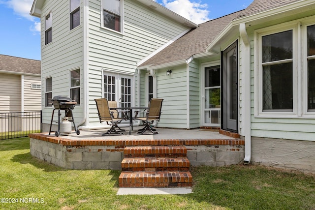 deck featuring a yard and area for grilling