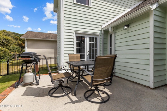 view of patio featuring grilling area and french doors