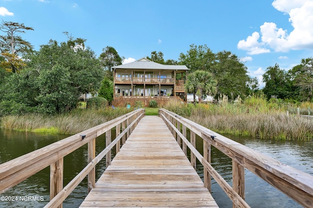 view of dock with a water view