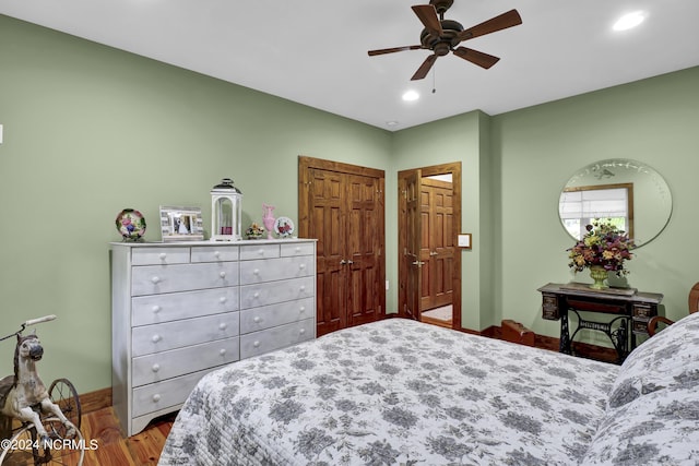 bedroom featuring recessed lighting, ceiling fan, baseboards, and wood finished floors