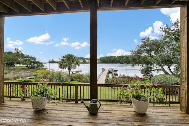 deck featuring a water view