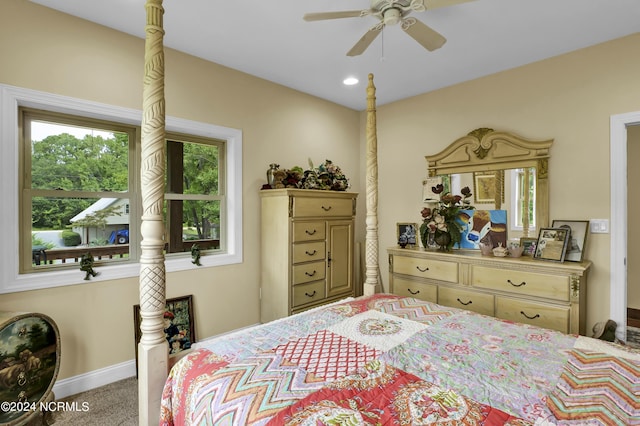 carpeted bedroom featuring ceiling fan and baseboards