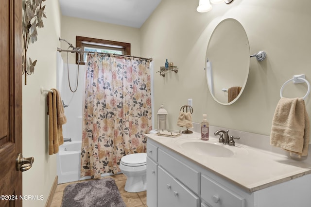 bathroom with vanity, tile patterned floors, shower / tub combo, and toilet