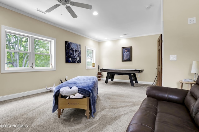 recreation room with crown molding, carpet, visible vents, and baseboards