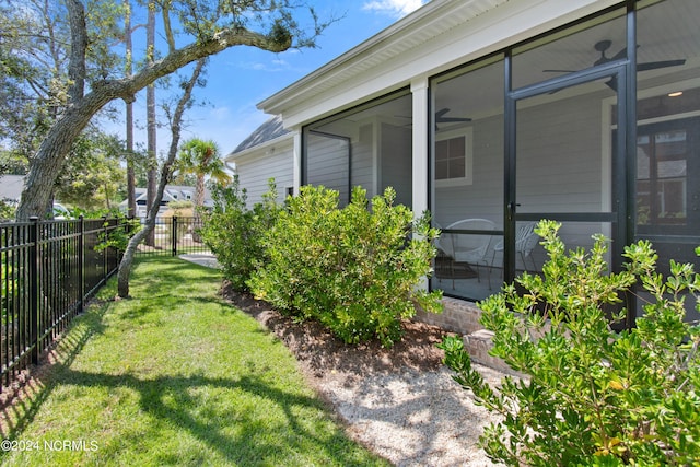 view of yard with a sunroom