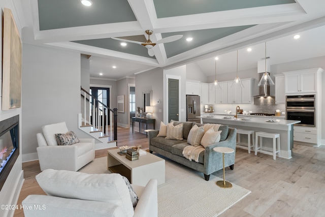 951 Trisail Ter, Wilmington, NC 28412 - living area with beam ceiling, stairway, light wood-style floors, a ceiling fan, and recessed lighting