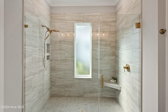 bathroom featuring an enclosed shower