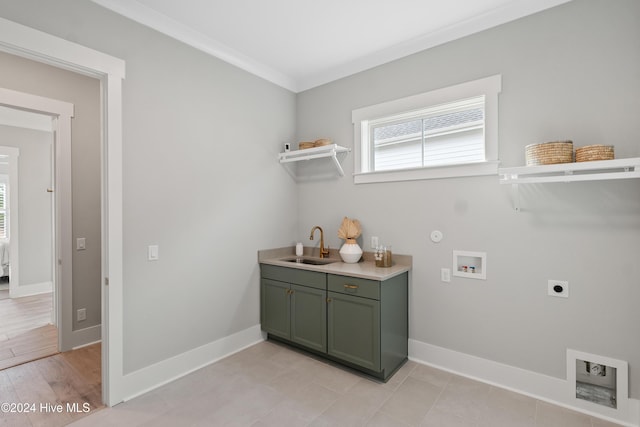 951 Trisail Ter, Wilmington, NC 28412 - laundry area featuring electric dryer hookup, hookup for a washing machine, crown molding, baseboards, and gas dryer hookup