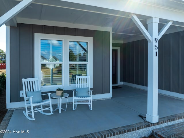 951 Trisail Ter, Wilmington, NC 28412 - view of patio / terrace featuring a porch