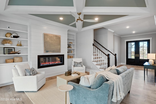 951 Trisail Ter, Wilmington, NC 28412 - living area featuring crown molding, stairway, built in features, wood finished floors, and baseboards
