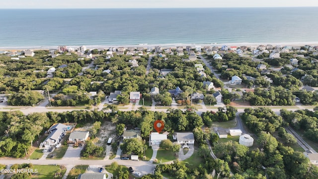 aerial view featuring a water view and a beach view