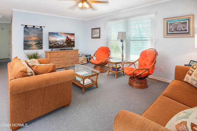 living room with ornamental molding, ceiling fan, and carpet floors