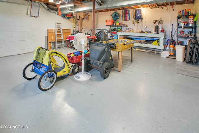 garage with a workshop area